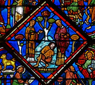 Raam w15 met een scène in het Barmhartige Samaritaan raam: de pelgrim wordt genegeerd door een priester en een Leviet door French School