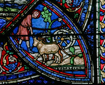 Raam w21 met een scène uit het leven van St. Eustache: hij bewerkt het land door French School