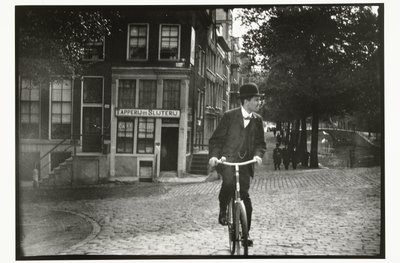 Fietser op de Keizersgracht in Amsterdam door George Hendrik Breitner