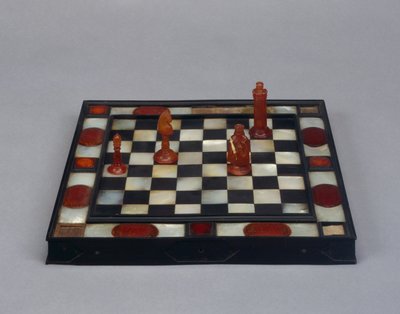 Schaakbord (ebbenhout, parelmoer, amber en hout) door German School