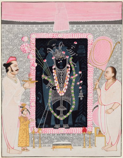 De hoofdpriester Tilakayat Govardhanlalji brengt offers aan Shri Nathji ter viering door Ghasiram Hardev Sharma