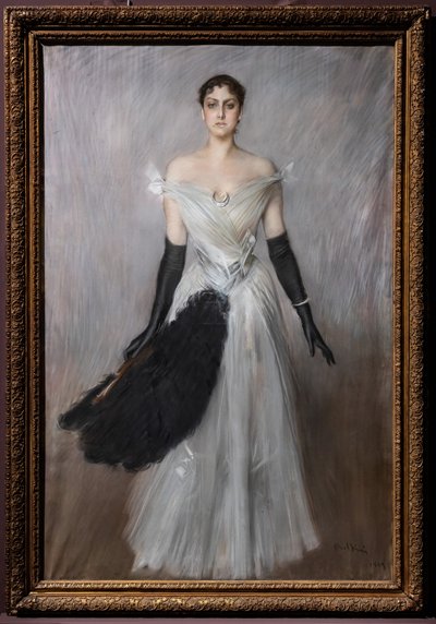Portret van een dame in het wit met handschoenen en waaier door Giovanni Boldini