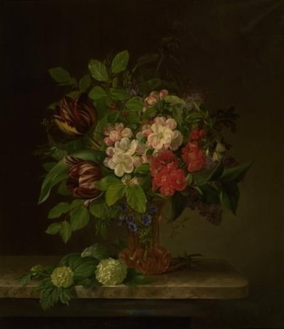Een glas met lentebloemen door Hanne Hellesen