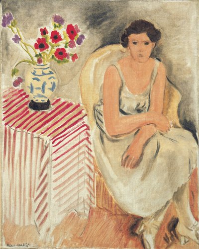 Vrouw op een stoel - Bloemen op tafel, of anjers door Henri Matisse
