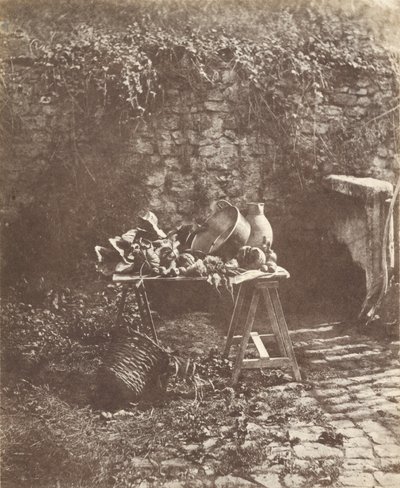 [Stilleven: ketel, kan en groenten op een schragentafel]. door Henri Victor Regnault