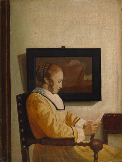 Een jonge vrouw die leest door Imitator of Johannes Vermeer