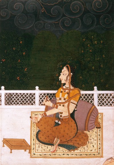 Een mooie vrouw, zittend tegen een kussen, c.1775 door Indian School
