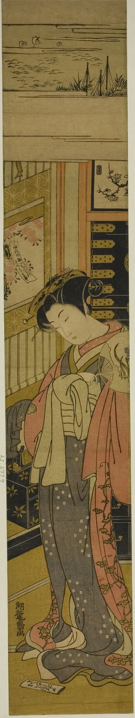 De courtisane Kaoru van Chojiya kijkt naar een liefdesbrief op de vloer door Isoda Koryusai
