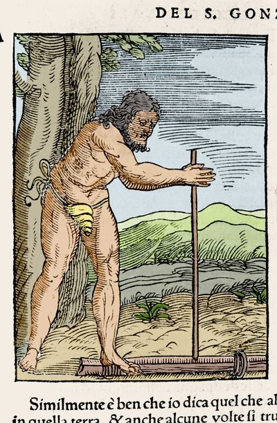 Een inheemse man die vuur maakt door twee stukken hout tegen elkaar te wrijven. Gravure uit 