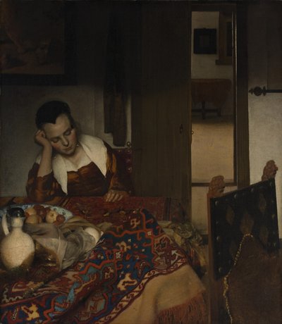 Meisje slapend aan een tafel door Johannes Vermeer