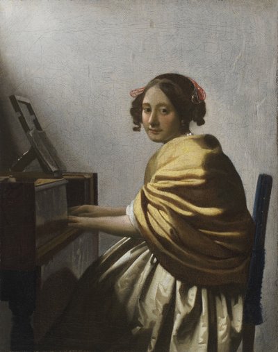 Een jonge vrouw zittend aan een virginaal, ca. 1670 door Jan Vermeer van Delft