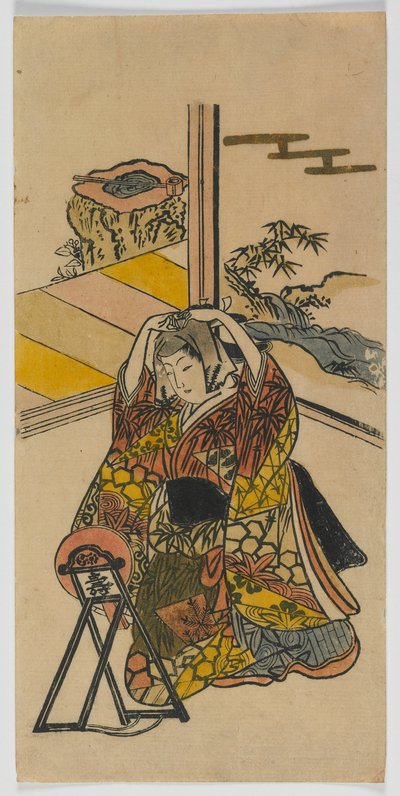 Jonge vrouw knielend naast een spiegel, Edo periode, 1720s door Japanese School