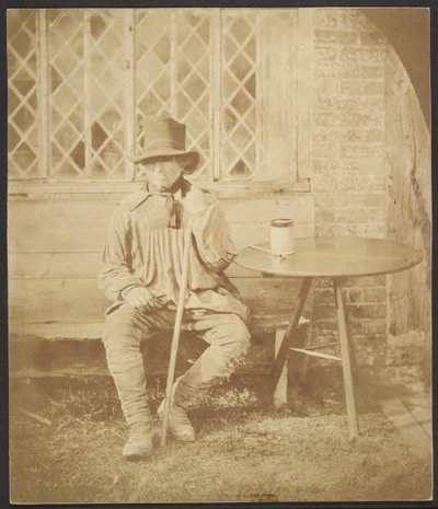 [Man zittend aan tafel] door John Whistler