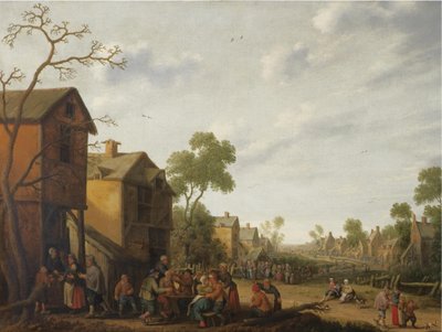 Een dorpsgezicht met etende en drinkende boeren buiten een herberg, bedelaars links door Joost Cornelisz Droochsloot