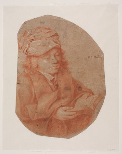Lezende jonge man met een doek om het hoofd gewikkeld door Karel van III Mander