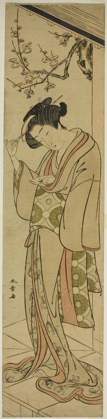 Vrouw op een veranda die op het punt staat een liefdesbrief te openen door Katsukawa Shunsho