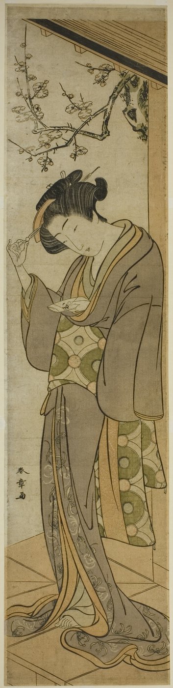 Vrouw op een veranda die op het punt staat een brief te openen door Katsukawa Shunsho