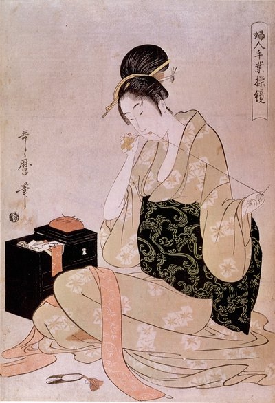 Naaien, vrouwenhandwerk serie: een naaister die draad met haar tanden knipt Japanse prent door Utamaro Kitagawa (1753-1806). 18e eeuw. Parijs, Guimet Museum, Nationaal Museum van Aziatische Kunst door Kitagawa Utamaro