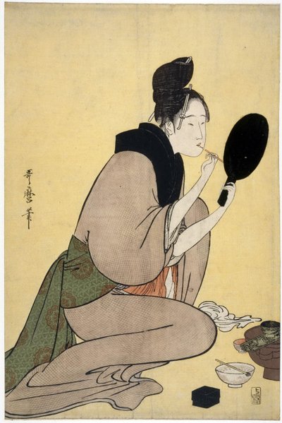 Meisje dat make-up aanbrengt op haar lippen door Kitagawa Utamaro