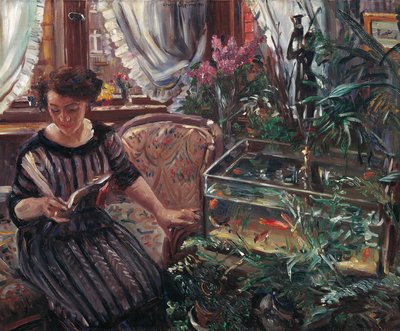 Een vrouw die leest bij een goudvissenkom, 1911 door Lovis Corinth