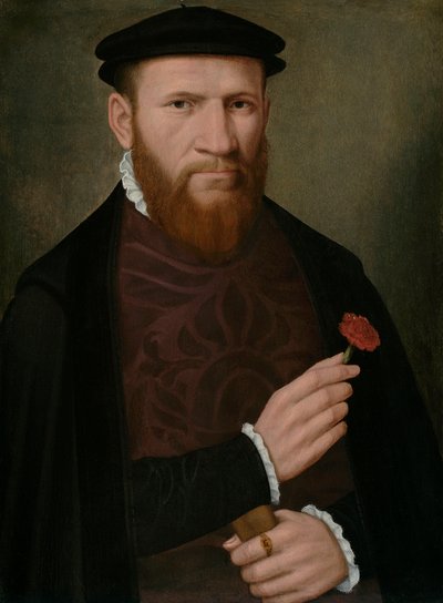 Portret van een man met zijn rechterhand een rode anjer vasthoudend en in zijn linker een handschoen door Master of the 1540s