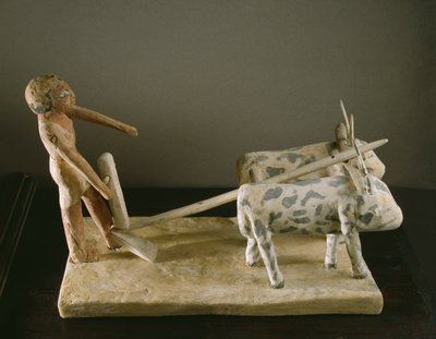 Grafmodel van een ploeger die zijn ploeg leidt getrokken door twee ossen door Middle Kingdom Egyptian