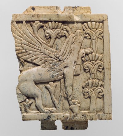 Meubelplaat gesneden in reliëf met een griffioen in een bloemrijk landschap, ca. 9e-8e eeuw v.Chr. (ivoor) door Neo Assyrian