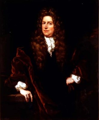 Portret van een heer in een bruine mantel door Nicolaes Maes