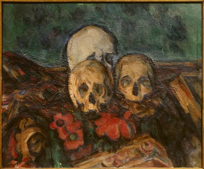 Drie schedels op een oosters tapijt door Paul Cézanne
