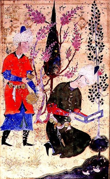 Een zittende prins die leest terwijl een dienaar wijn serveert, uit de Tohfat Al-Ahrar, Bokhara School door Persian School