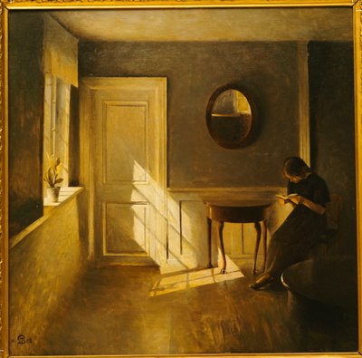 Een meisje lezend in een interieur door Peter Vilhelm Ilsted