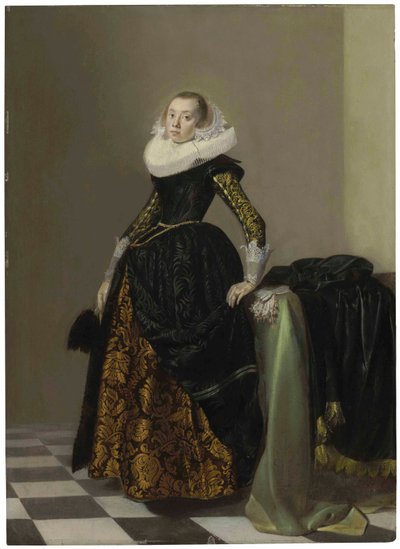 Portret van een rijk geklede jongedame, ten voeten uit, voor een gedrapeerde tafel door Pieter Codde