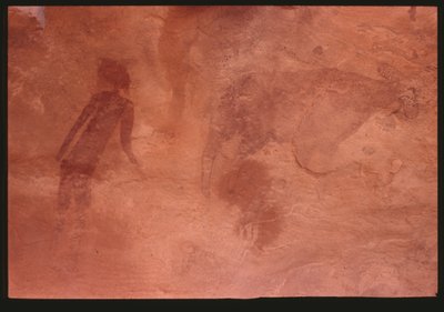 Menselijke figuur en een stier (rots schildering) door Prehistoric