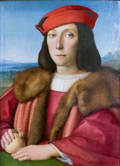 Portret van een jonge man met een appel, mogelijk Francesco Maria della Rovere door Raphael (1483 1520)