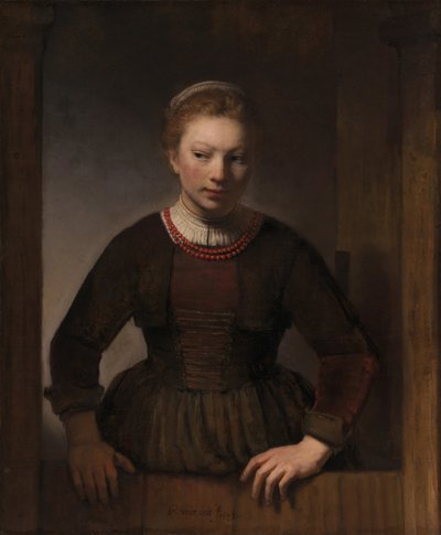 Jonge vrouw bij een open halve deur door Rembrandt Harmensz van Rijn