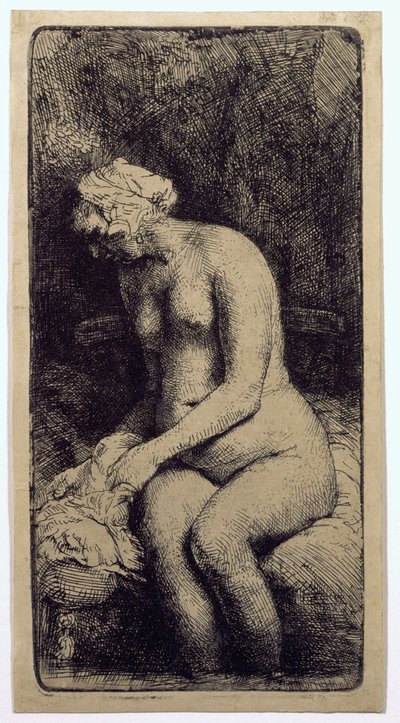 Een vrouw die haar voeten baadt in een beek door Rembrandt van Rijn