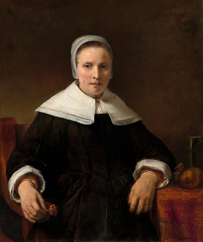 Een Vrouw die een Roze Vasthoudt door Rembrandt van Rijn