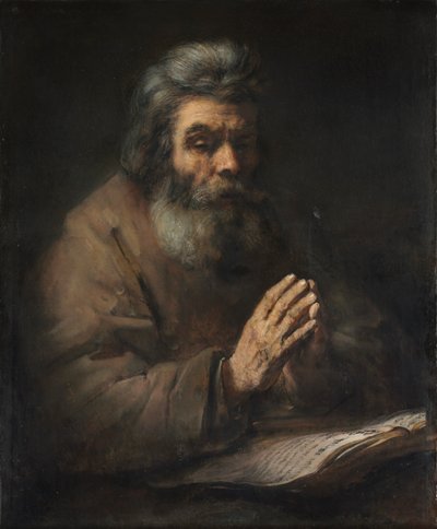 Een oudere man in gebed, 1660s of later door Rembrandt van Rijn