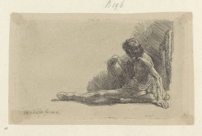 Jonge man, zittend op de grond met één been uitgestrekt door Rembrandt van Rijn