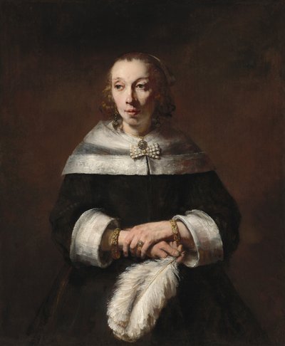 Portret van een dame met een struisvogelveren waaier door Rembrandt van Rijn