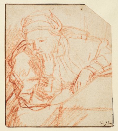 Saskia zittend aan een tafel door Rembrandt van Rijn