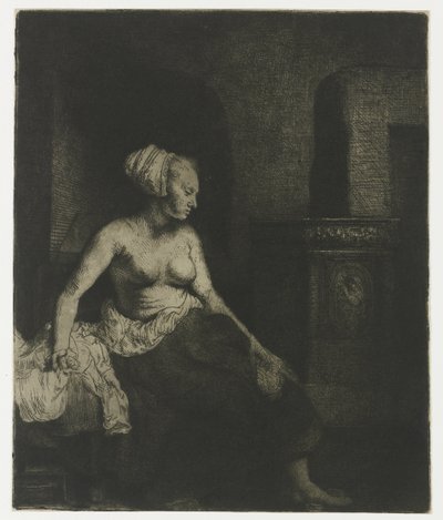 Zittende vrouw half gekleed naast een kachel door Rembrandt van Rijn