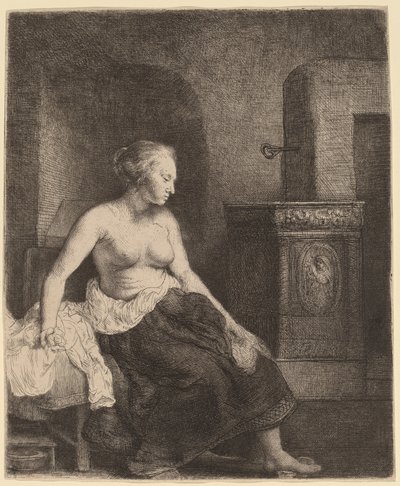 Vrouw Zittend Halfgekleed naast een Kachel door Rembrandt van Rijn