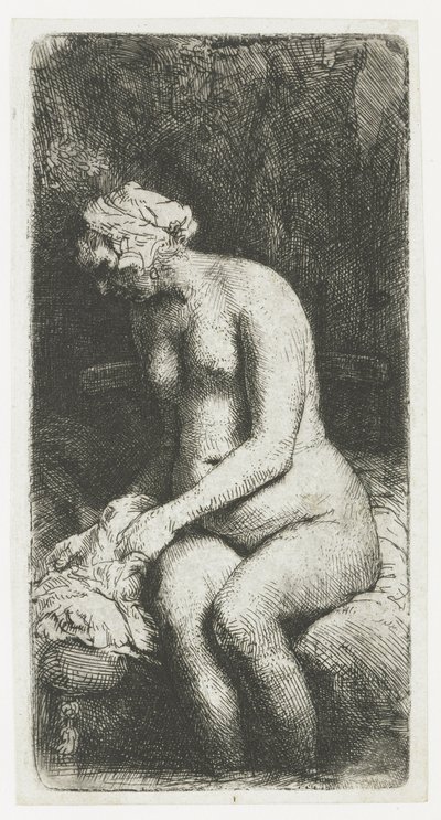 Vrouw die haar voeten baadt in een beek door Rembrandt van Rijn