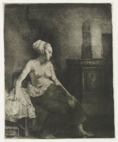 Vrouw zittend half gekleed naast een kachel door Rembrandt van Rijn
