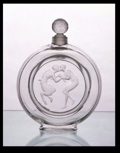 Le Baiser du Faune, heldere glazen parfumfles voor Molinard door Lalique door Rene Jules Lalique