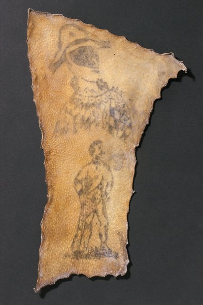 Getatoeëerde menselijke huid met harlekijn en figuur van Samson, Frans door John Pardon