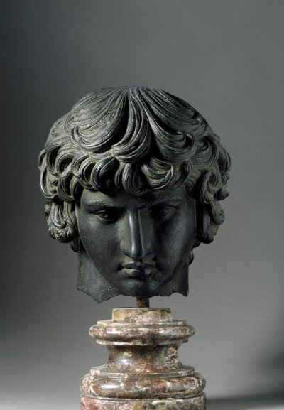 Romeinse kunst: voorstelling van Antinous (of Antinoo, ca. 110-130), jonge minnaar van keizer Hadrianus. Bronzen sculptuur. Florence, Museo Archeologico door Roman