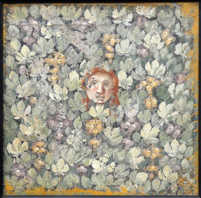 Masker op wijnbladeren en druiventrossen, 1e helft 1e eeuw na Chr. door Roman Pompeian wall painting.