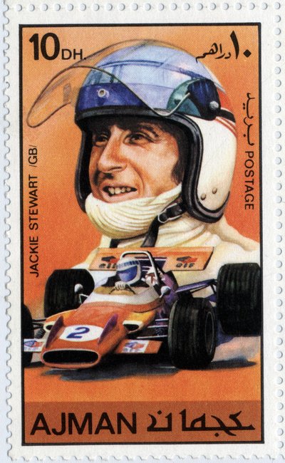 Emiraten Arabische Eenheden postzegel met Schotse autocoureur Jackie Stewart (geb. 1939) door School Arabic